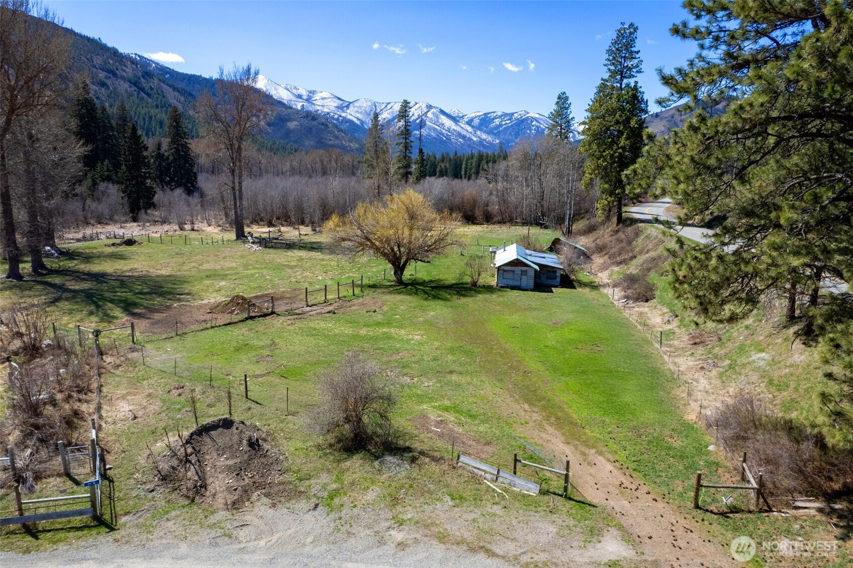 929 A Twisp River Road Twisp, WA 98856 - Photo 6 of 19 a view of a garden with a slide
