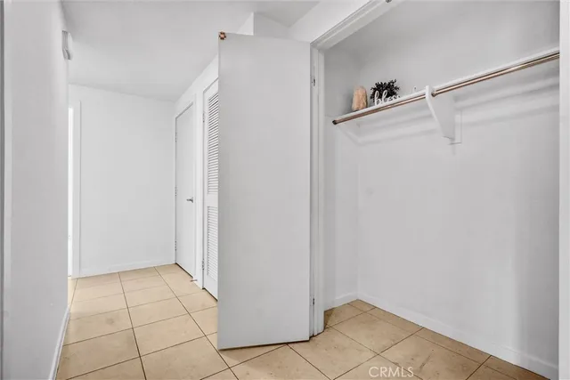 a white refrigerator freezer sitting inside of a kitchen