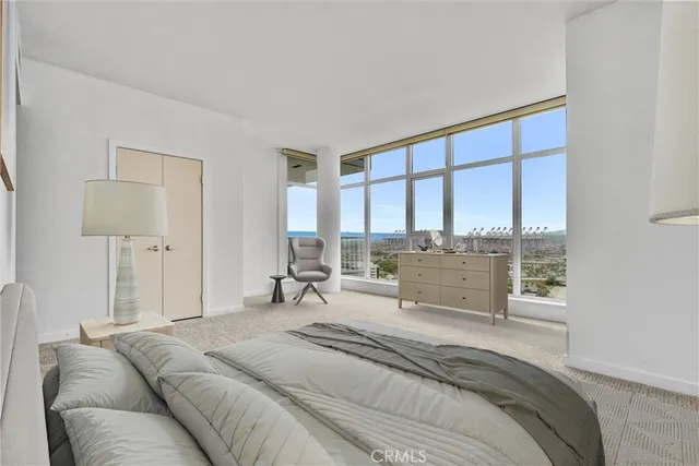 a view of an empty room with a balcony