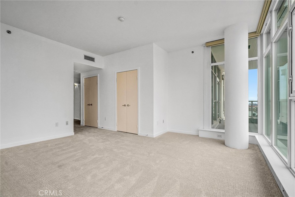 411 West Seaside Way, Unit 1804 Long Beach, CA 90802 - Photo 29 of 55 an empty room with windows