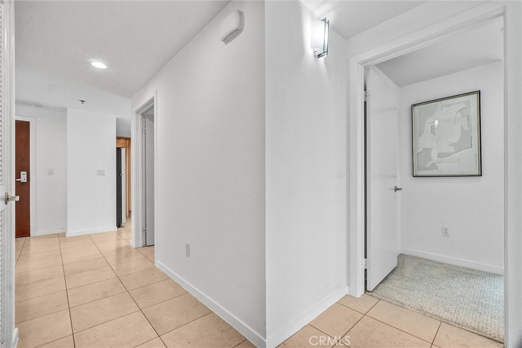 411 West Seaside Way, Unit 1804 Long Beach, CA 90802 - Photo 32 of 55 a view of a hallway with closet and bathroom