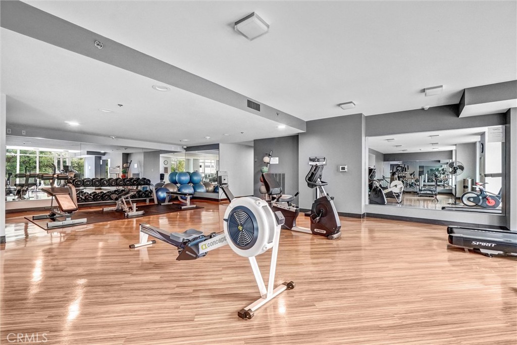 411 West Seaside Way, Unit 1804 Long Beach, CA 90802 - Photo 33 of 55 a view of a room with gym equipment