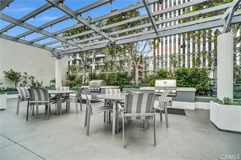 411 West Seaside Way, Unit 1804 Long Beach, CA 90802 - Photo 38 of 55 a view of a dining room with furniture window and outside view