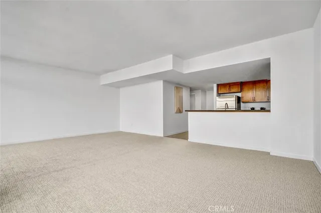 a view of a room with a cabinet and a window