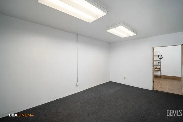 a room with a window and a sink