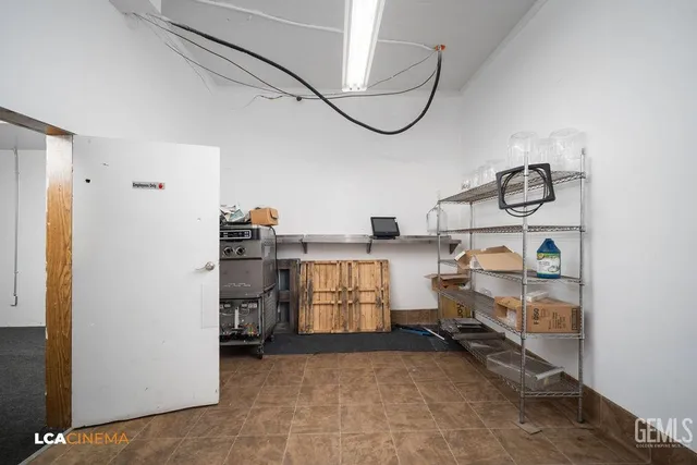 a view of walk in closet with cabinet