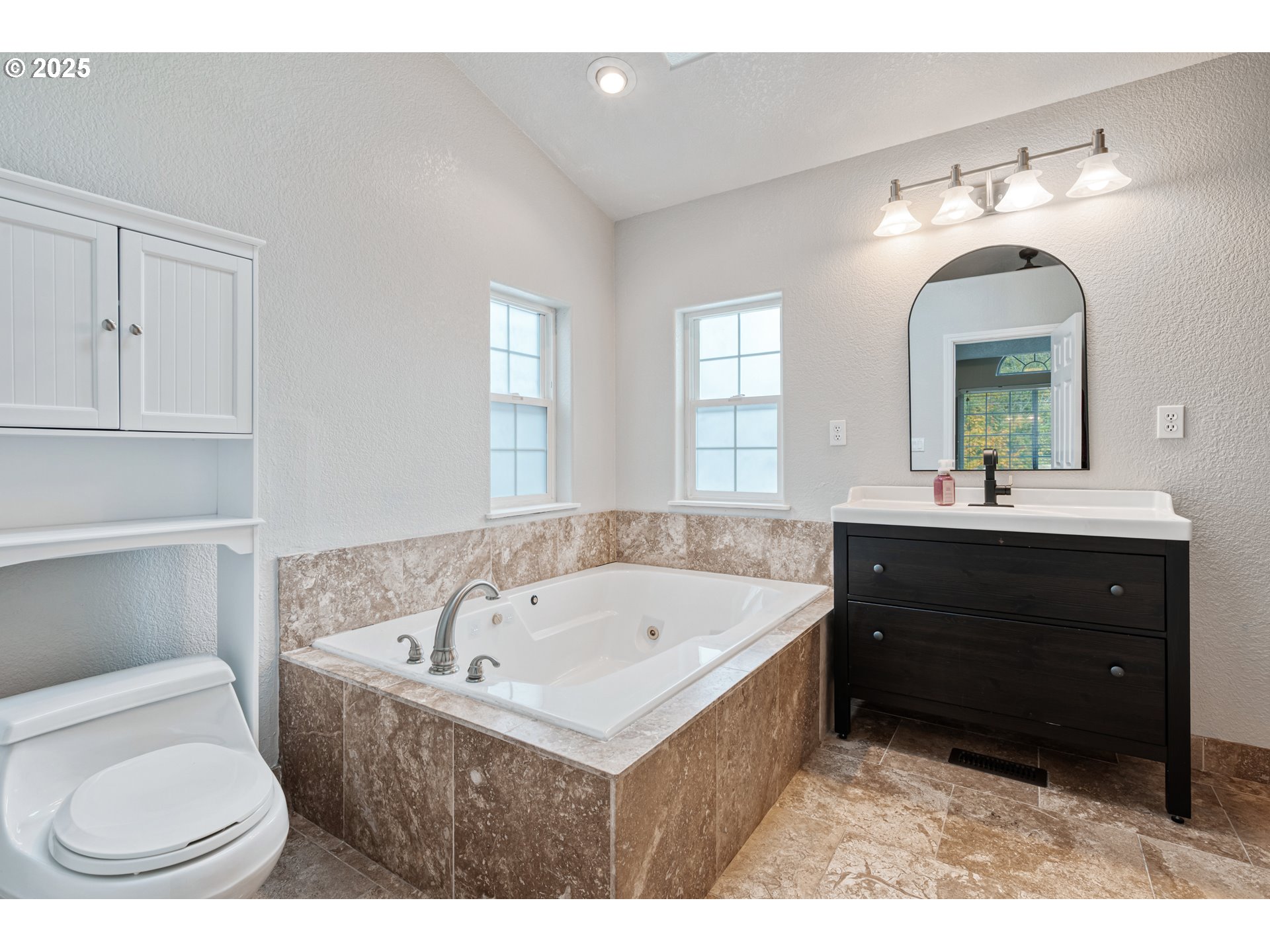 2770 48th Avenue Longview, WA 98632 - Photo 16 of 31 a bathroom with a sink and a mirror