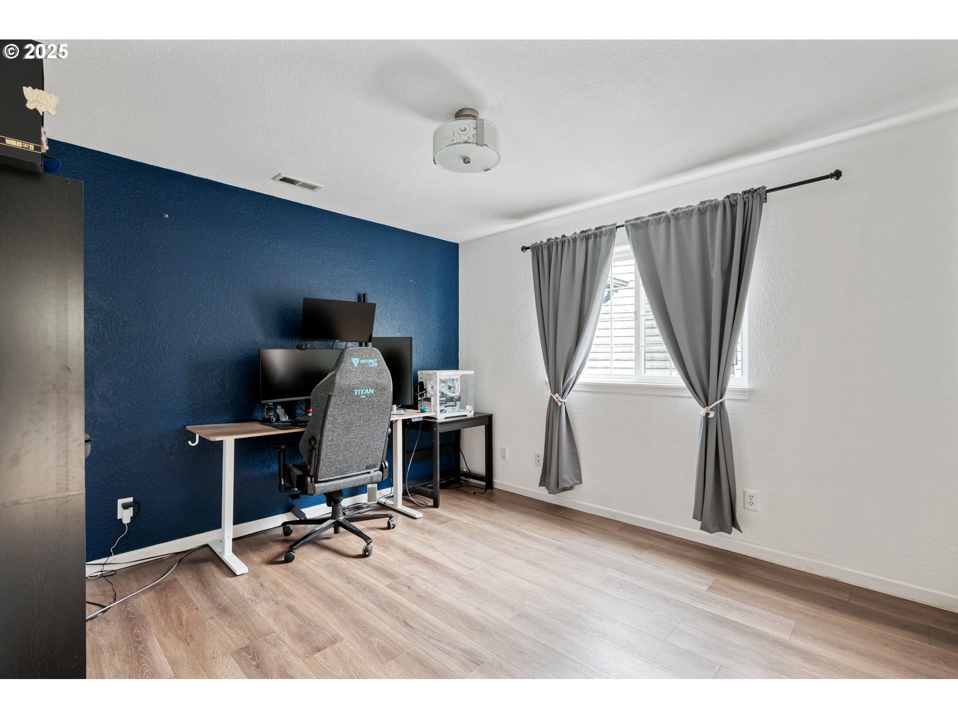 2770 48th Avenue Longview, WA 98632 - Photo 21 of 31 a view of a workspace with furniture and a window