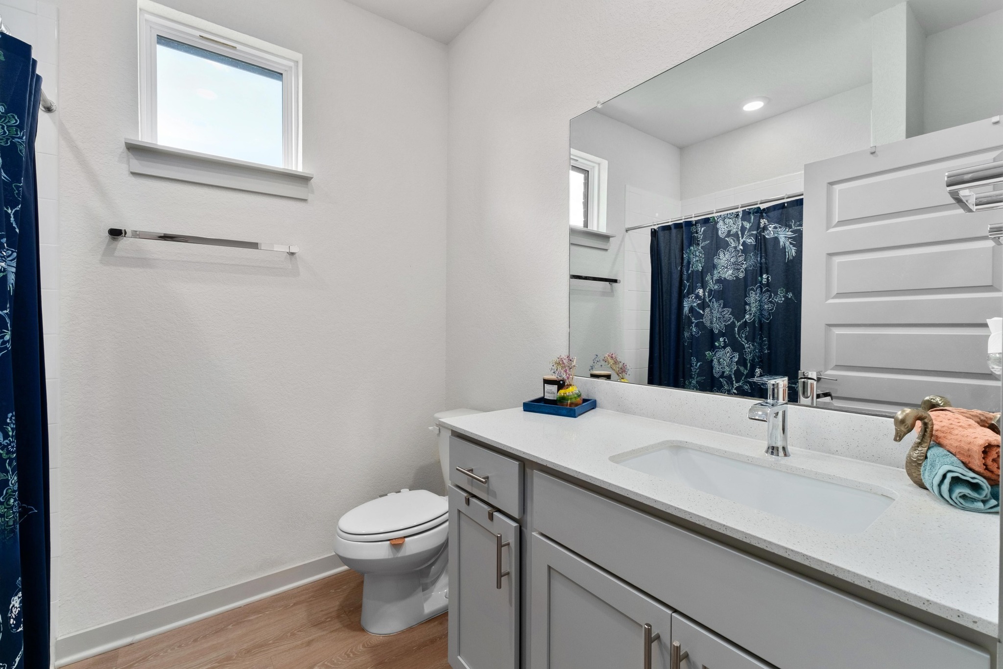 10509 Defender Trail Austin, TX 78754 - Photo 21 of 37 a bathroom with a sink a toilet and mirror
