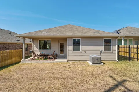 a view of a house with lounge chair