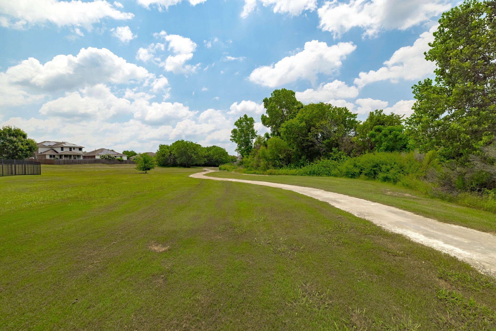 10509 Defender Trail Austin, TX 78754 - Photo 29 of 37 a view of a lake and yard