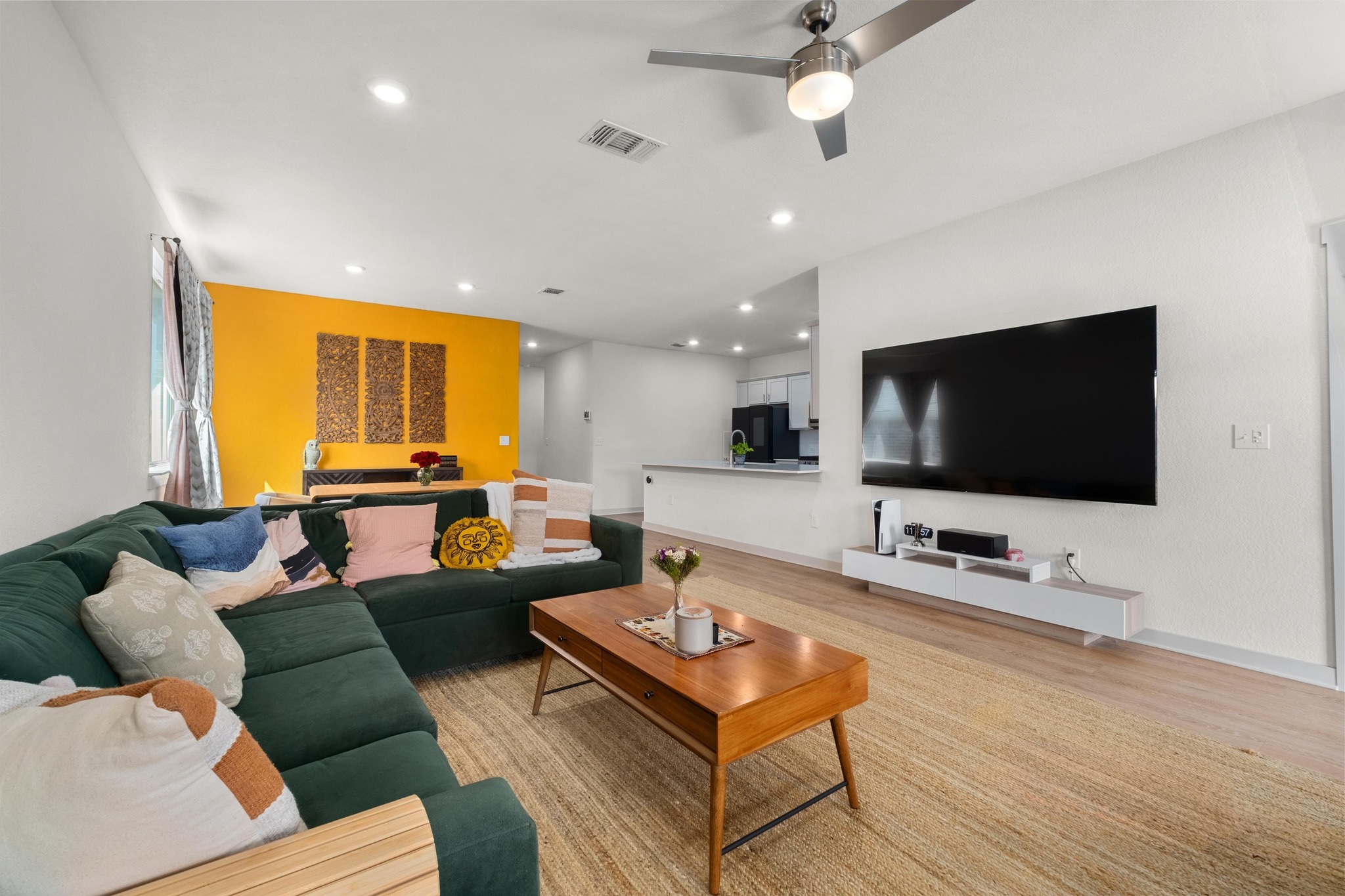 10509 Defender Trail Austin, TX 78754 - Photo 4 of 37 a living room with furniture and a flat screen tv
