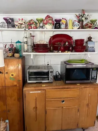 a view of storage and utility room with washer and dryer