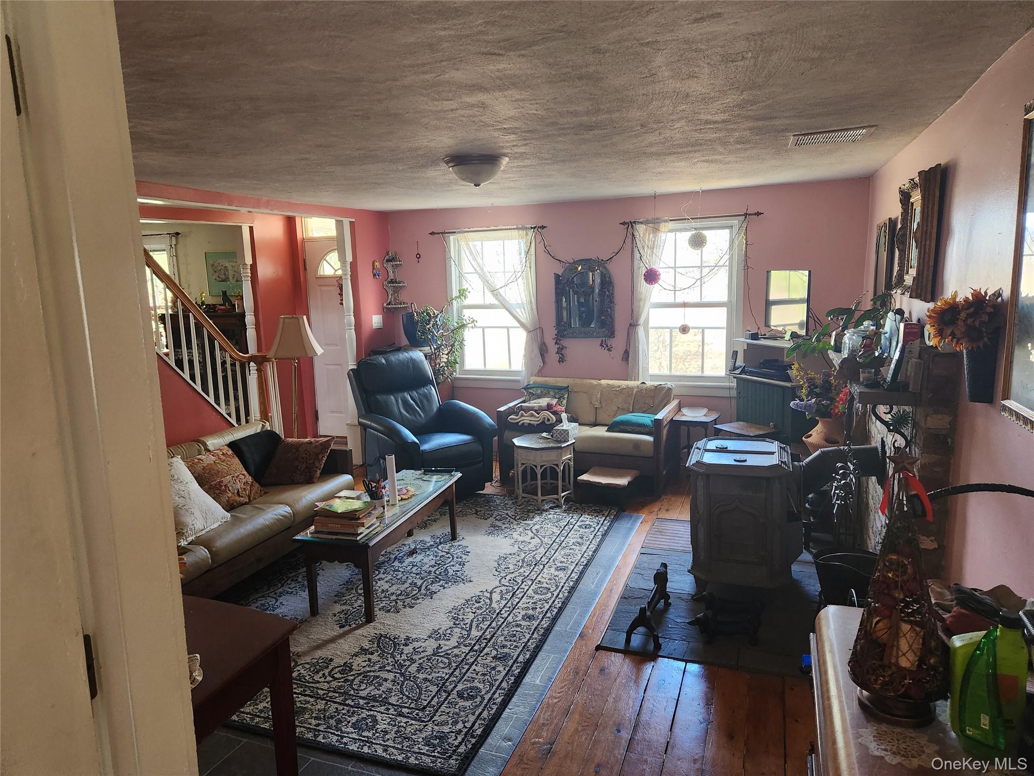 26 Bloody Hill Road Craryville, NY 12521 - Photo 12 of 18 a living room with furniture fireplace and a large window