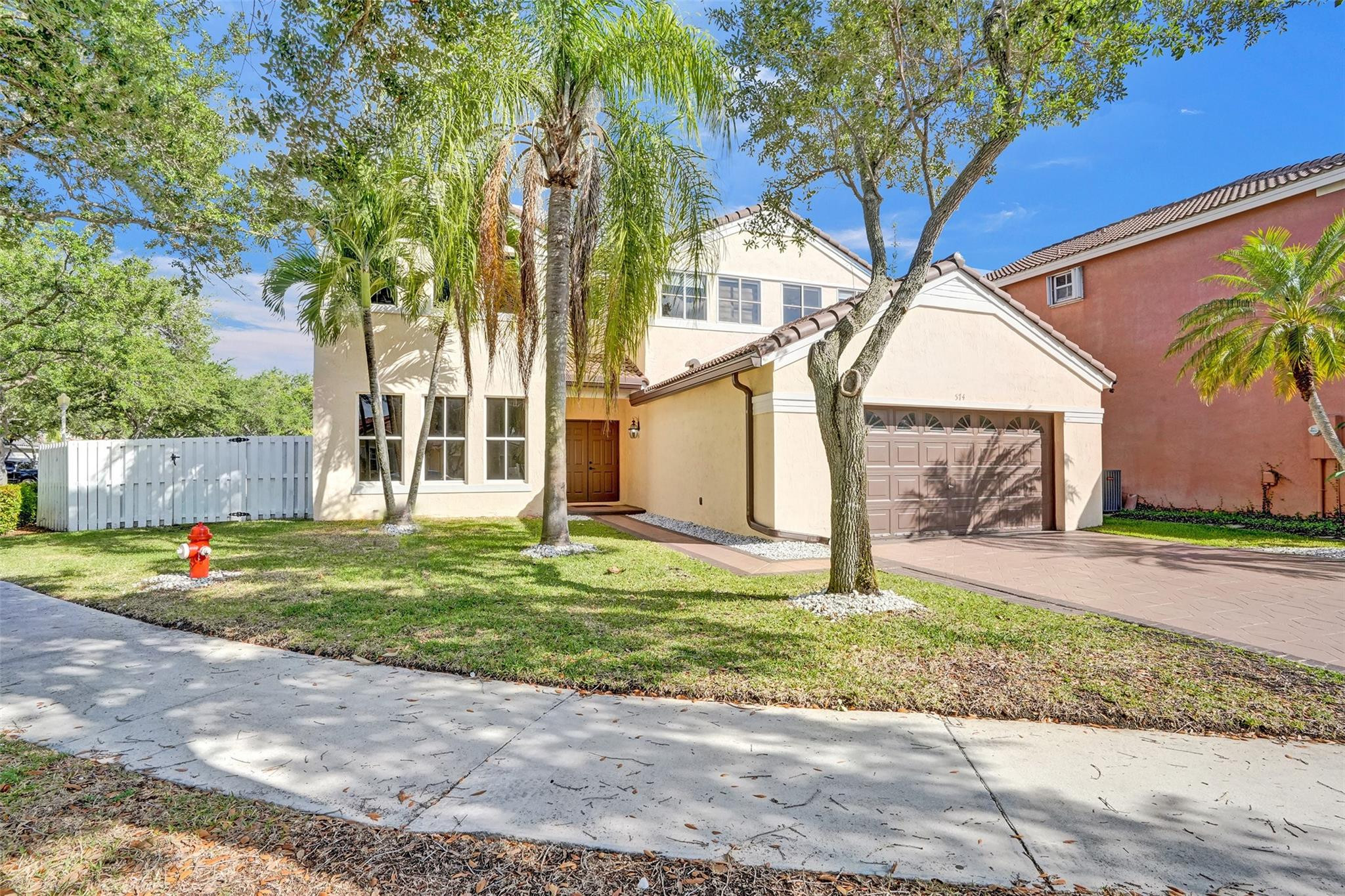 574 Slippery Rock Road Weston, FL 33327 - Photo 1 of 64 a view of a house with a yard