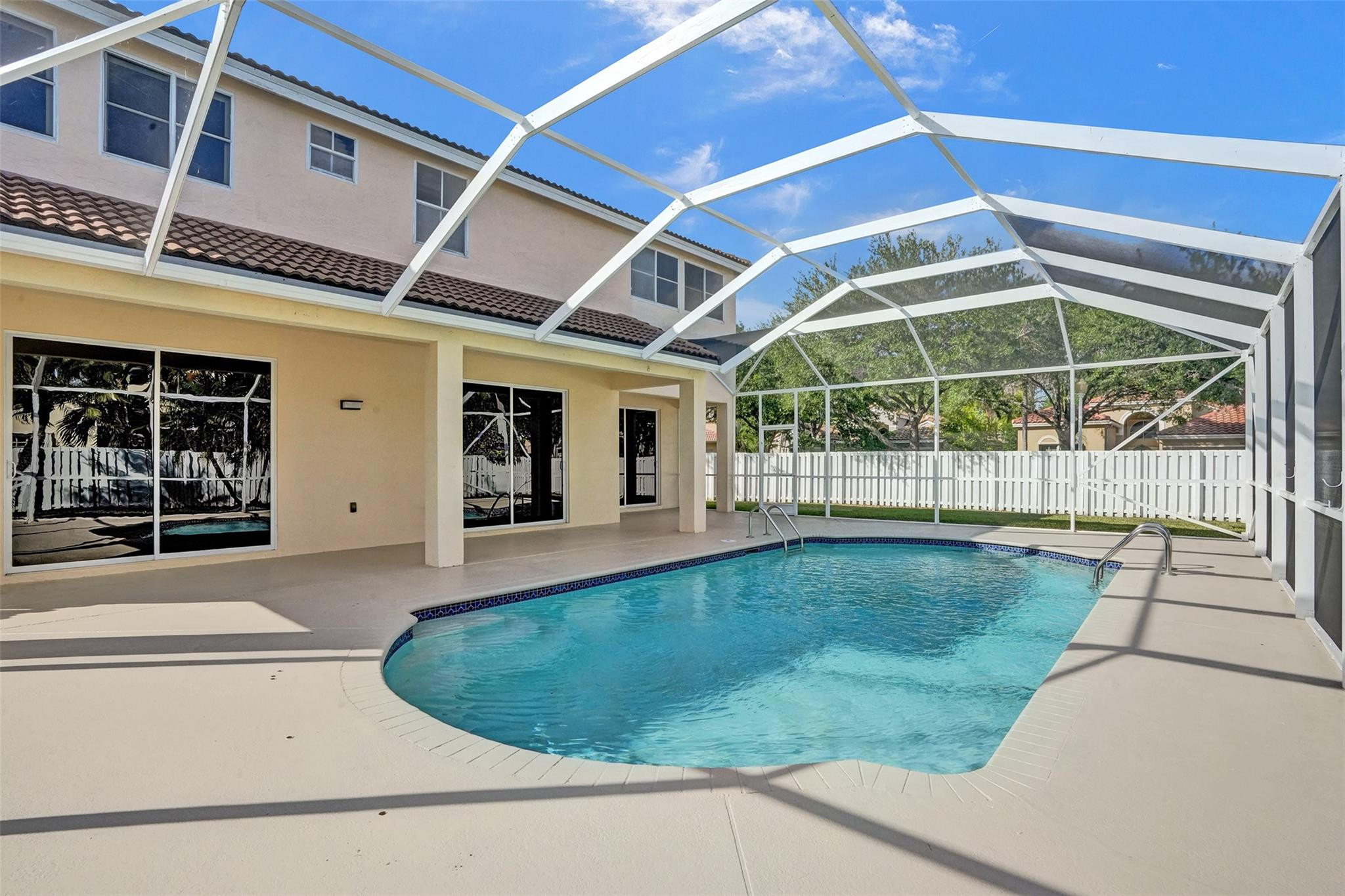 574 Slippery Rock Road Weston, FL 33327 - Photo 11 of 64 a view of a backyard of a house