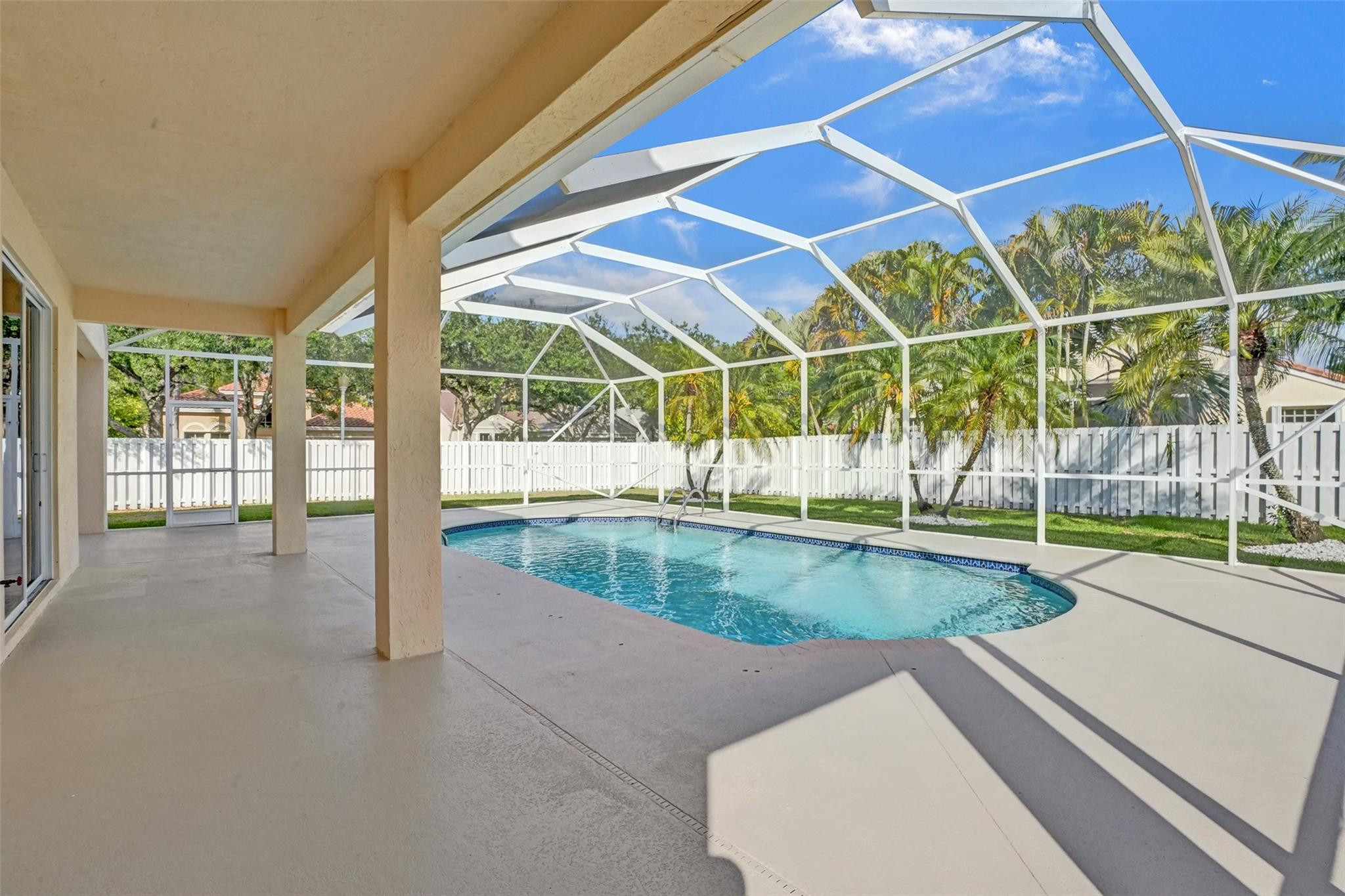 574 Slippery Rock Road Weston, FL 33327 - Photo 12 of 64 a view of a backyard