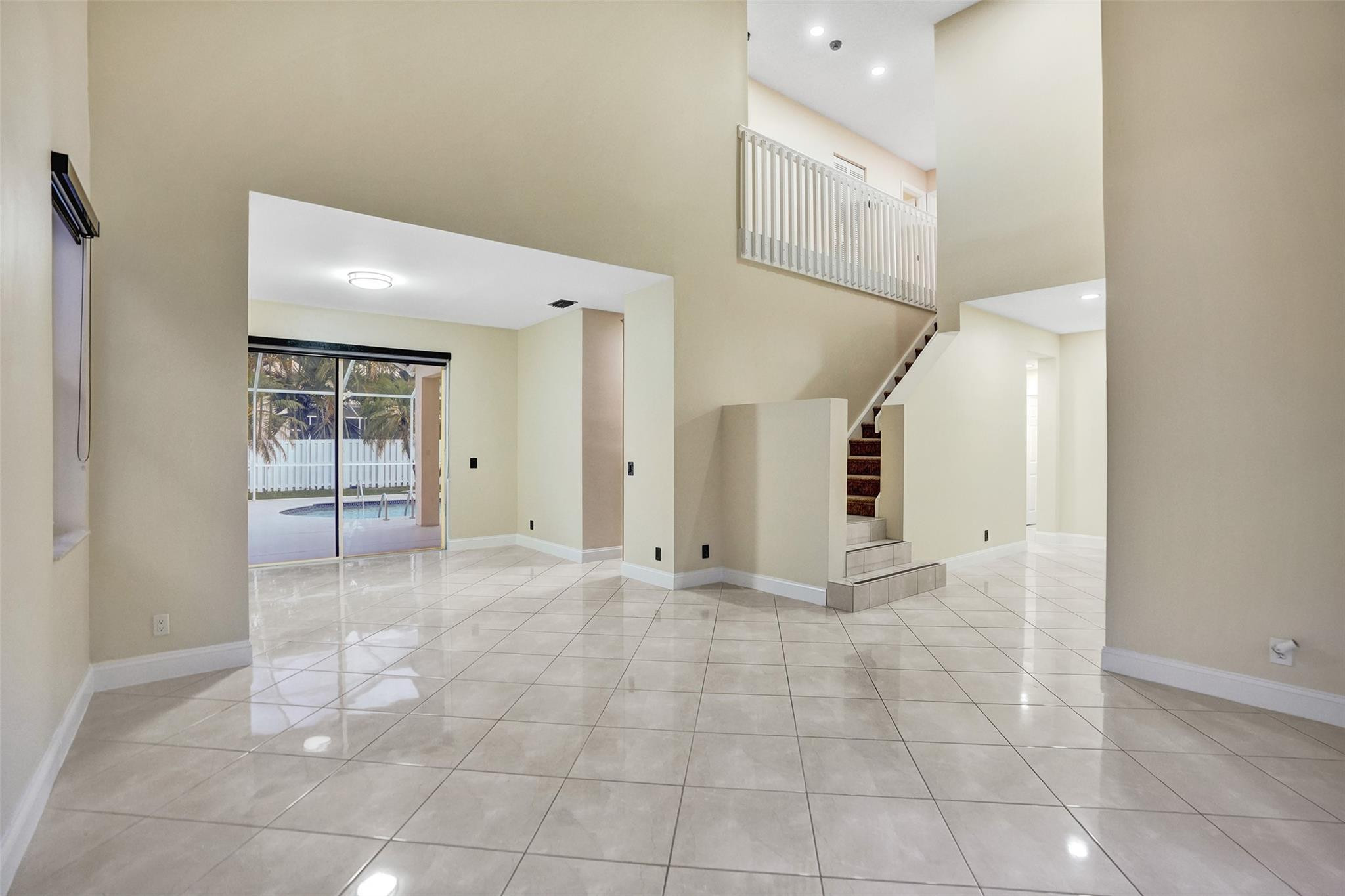 574 Slippery Rock Road Weston, FL 33327 - Photo 27 of 64 a view of an empty room