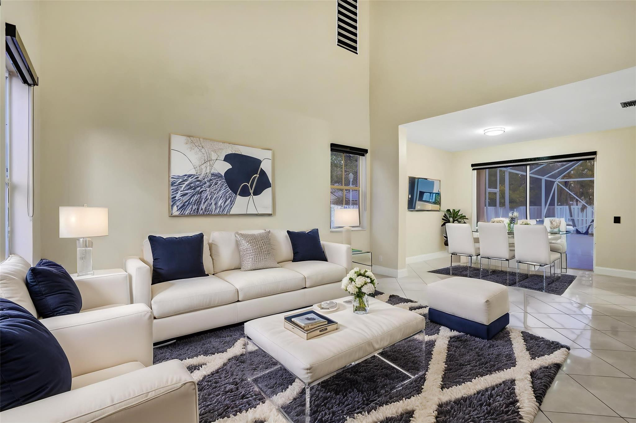 574 Slippery Rock Road Weston, FL 33327 - Photo 3 of 64 a living room with furniture and a table