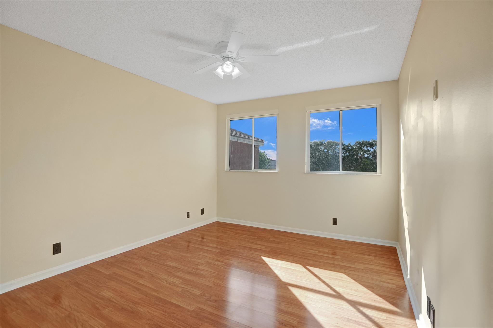 574 Slippery Rock Road Weston, FL 33327 - Photo 38 of 64 a view of empty room with wooden floor