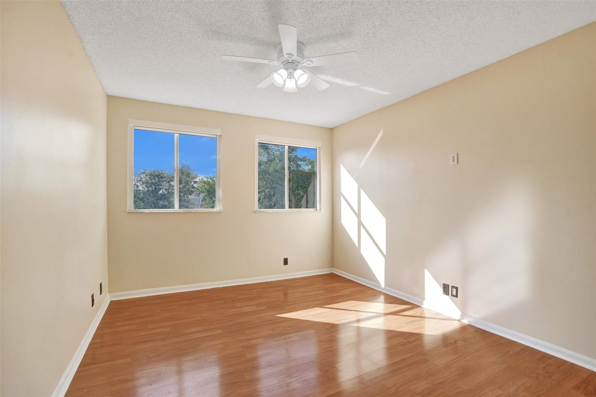 574 Slippery Rock Road Weston, FL 33327 - Photo 39 of 64 a view of an empty room with a window