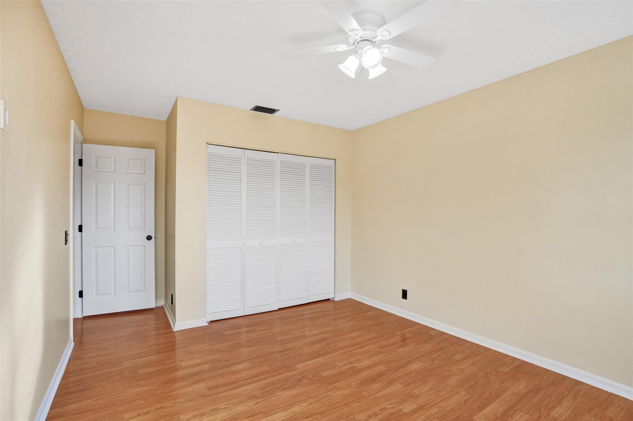 574 Slippery Rock Road Weston, FL 33327 - Photo 41 of 64 a view of empty room with wooden floor