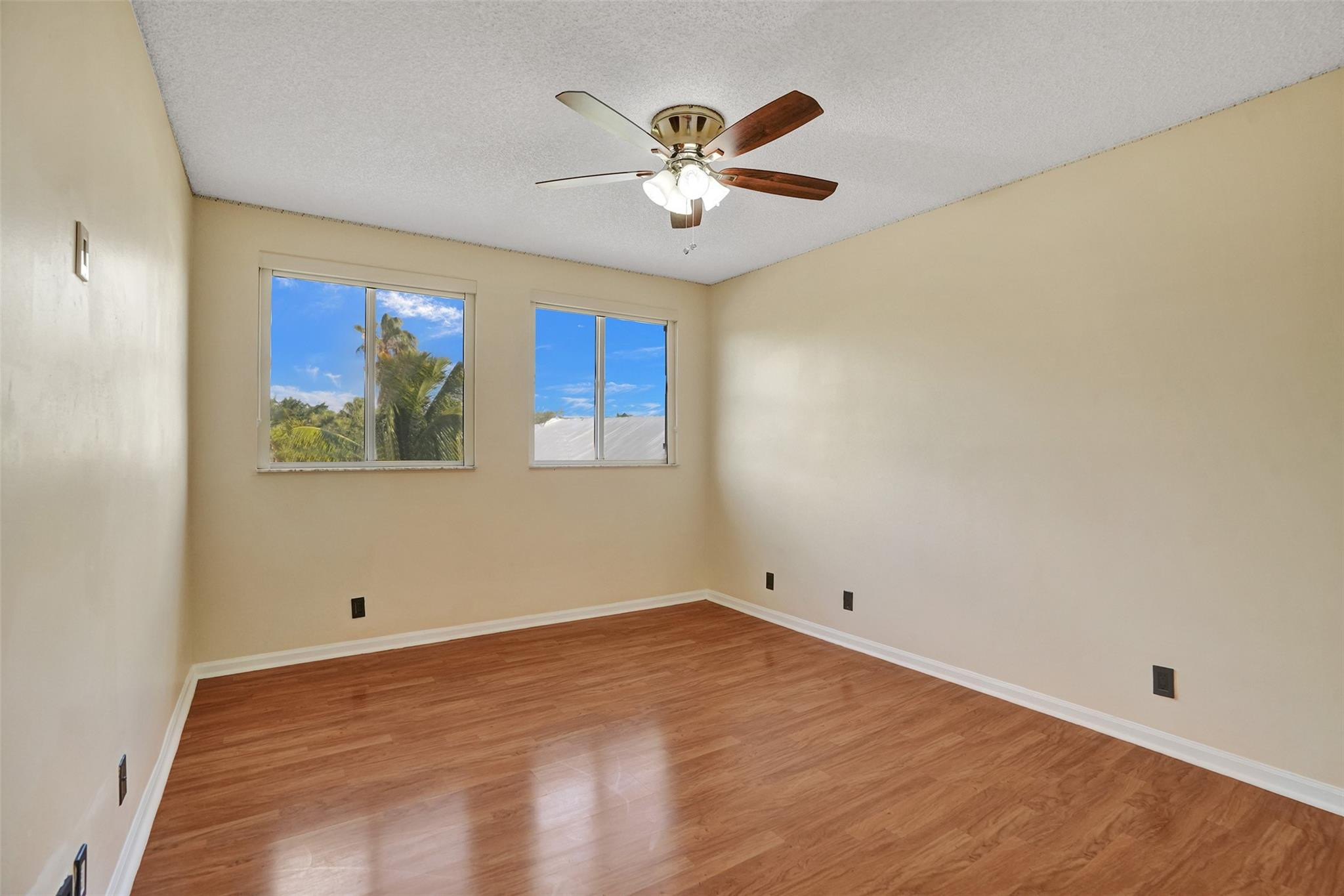 574 Slippery Rock Road Weston, FL 33327 - Photo 42 of 64 a view of empty room with wooden floor