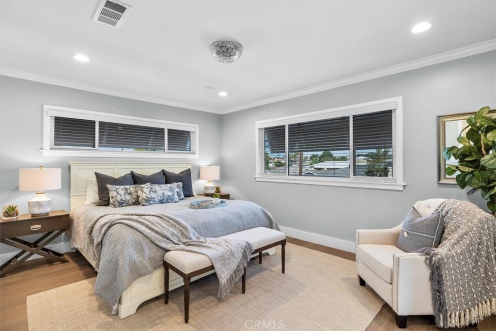 1416 11th Street Manhattan Beach, CA 90266 - Photo 16 of 28 a bedroom with a bed and window