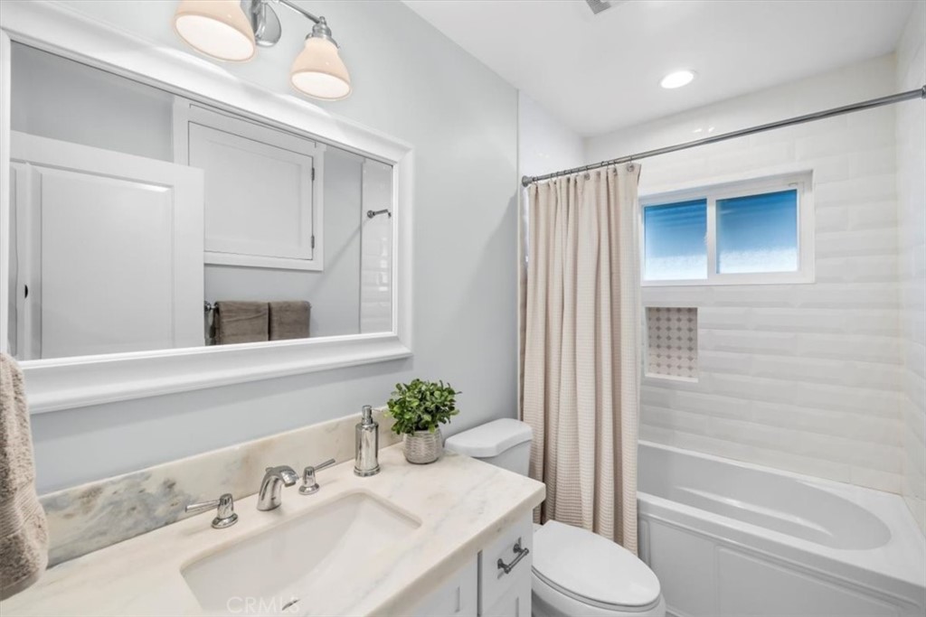 1416 11th Street Manhattan Beach, CA 90266 - Photo 20 of 28 a bathroom with a sink toilet and shower