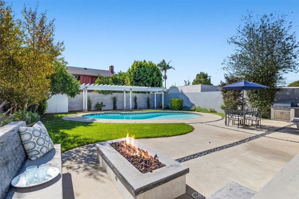 1416 11th Street Manhattan Beach, CA 90266 - Photo 24 of 28 a view of a swimming pool with a patio