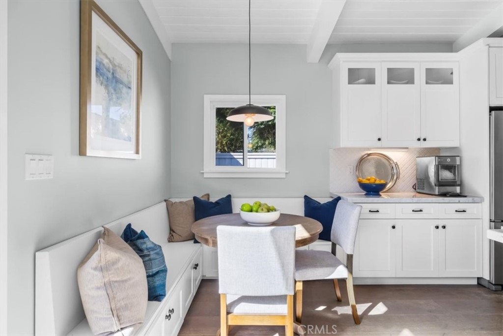 1416 11th Street Manhattan Beach, CA 90266 - Photo 7 of 28 a bedroom with furniture and a wooden floor