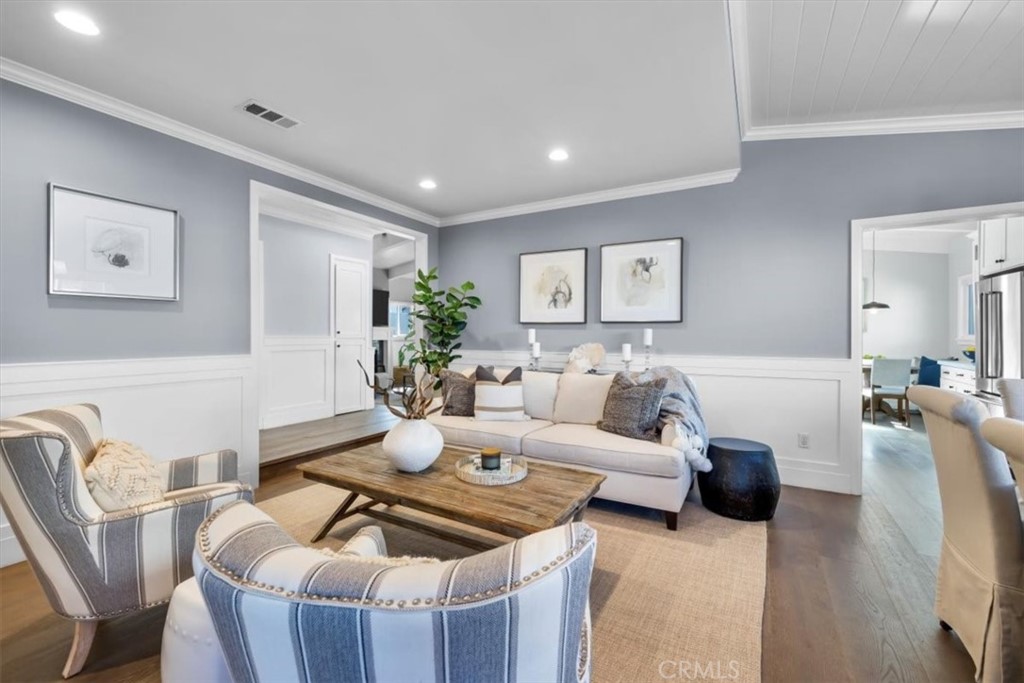 1416 11th Street Manhattan Beach, CA 90266 - Photo 10 of 28 a living room with furniture and painting on the wall