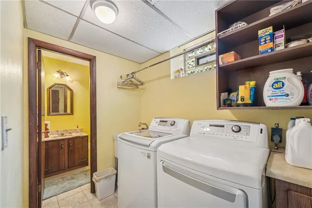 a utility room with dryer and washer