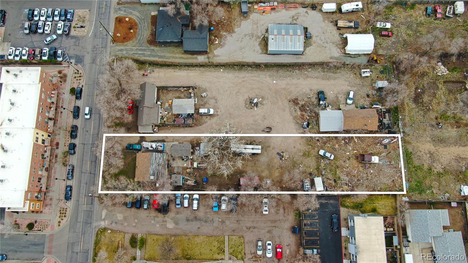 5409 Allison Street Arvada, CO 80002 - Photo 3 of 5 an aerial view of a house with a swimming pool