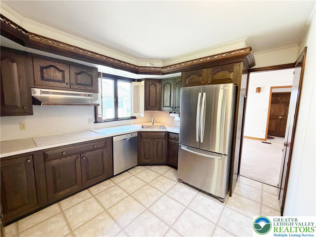 2741 Limestone Street Coplay, PA 18037 - Photo 6 of 35 a kitchen with stainless steel appliances granite countertop a refrigerator and a sink