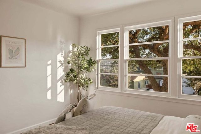 a very nice looking dining room with a table and chairs