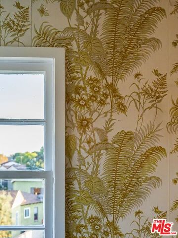 a kitchen with stainless steel appliances granite countertop a stove and a microwave