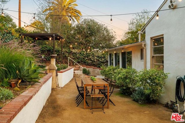 a view of an outdoor sitting area with fire pit