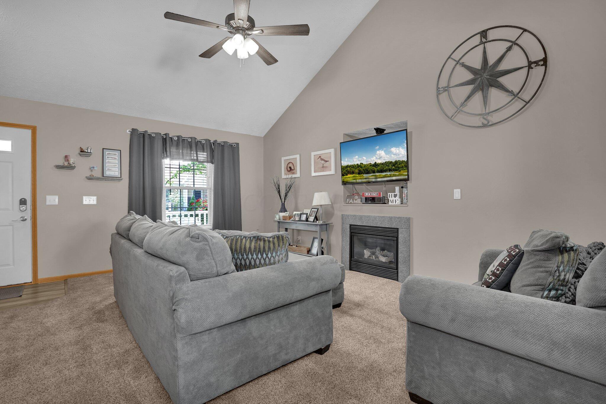569 Rockets Street, Unit 154 Galloway, OH 43119 - Photo 3 of 40 Spacious family room with cathedral ceiling.