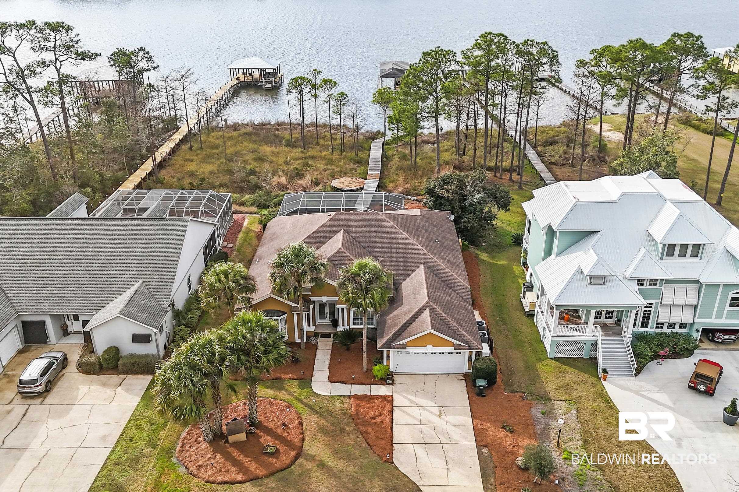 8591 Bay Harbor Road Elberta, AL 36530 - Photo 5 of 56 Aerial view of residential area featuring a nearby body of water
