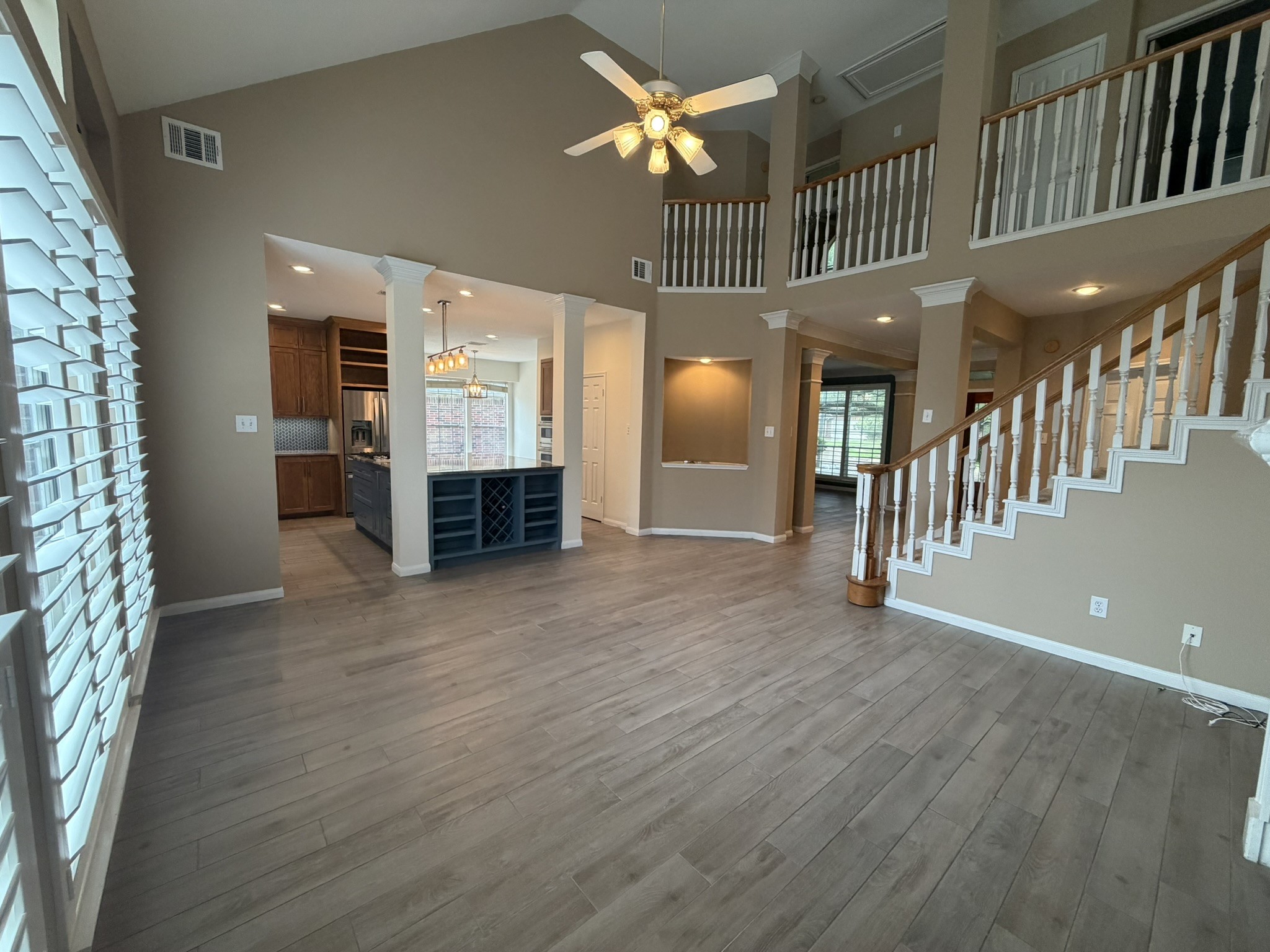 13810 Inland Spring Court Houston, TX 77059 - Photo 15 of 27 Beautiful plantation shutters throughout allow an abundance of natural light