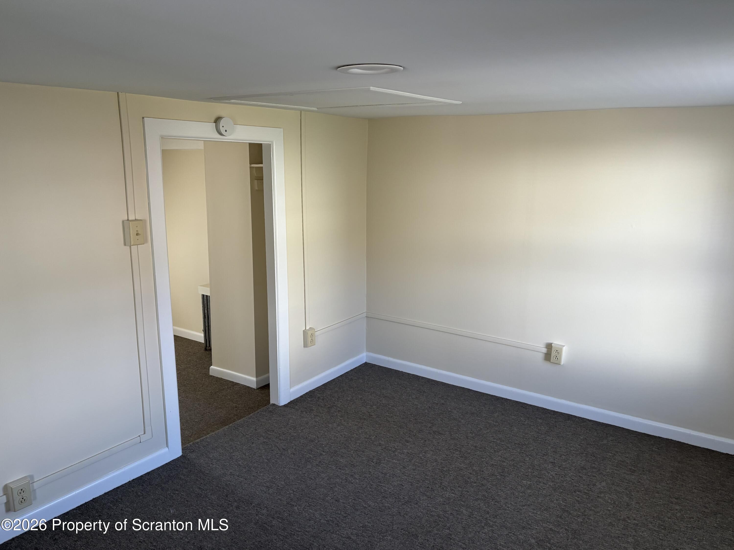 146 6th Street Blakely, PA 18447 - Photo 13 of 24 an empty room with an entryway