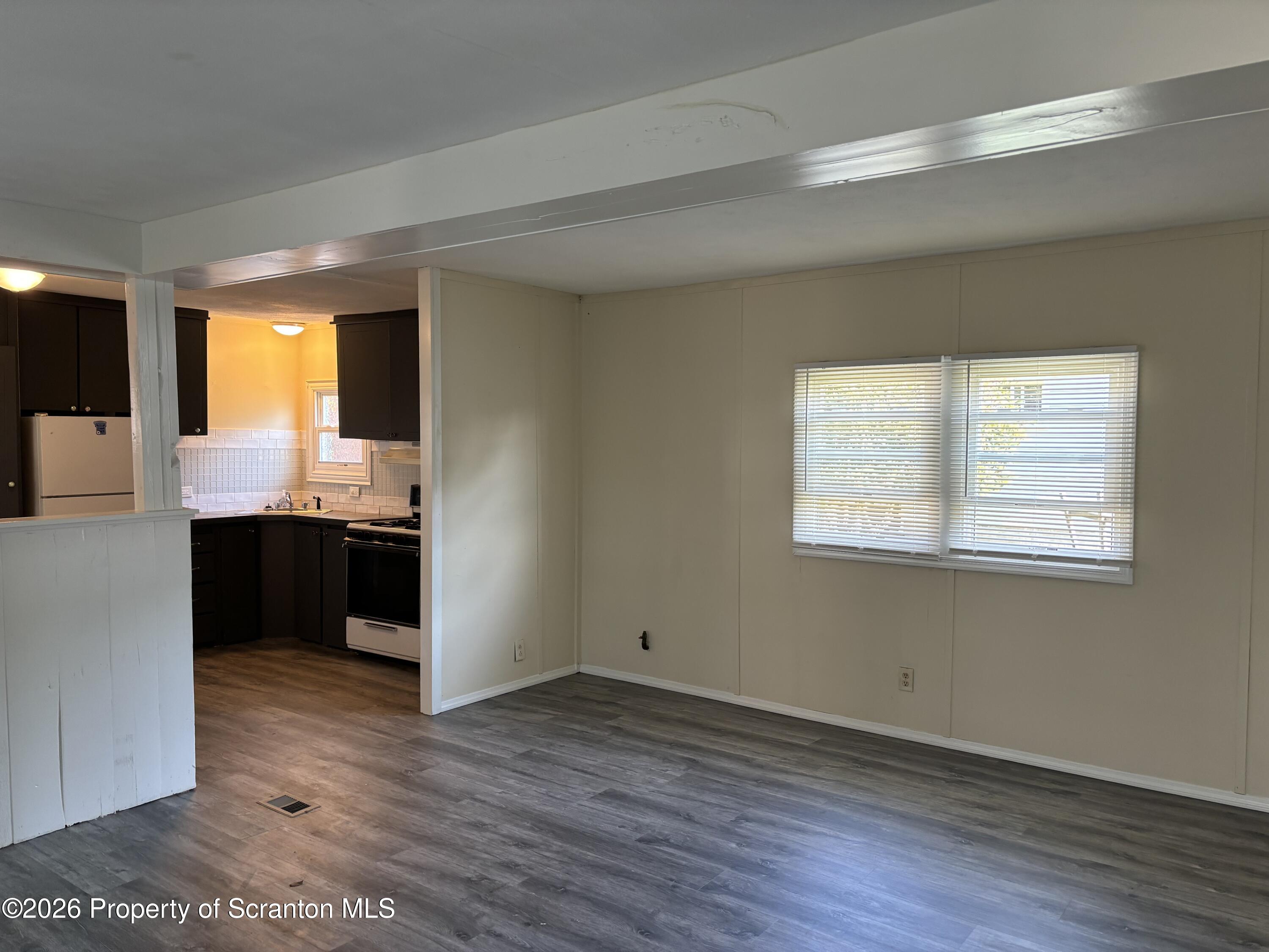 146 6th Street Blakely, PA 18447 - Photo 17 of 24 a view of kitchen and wooden floor