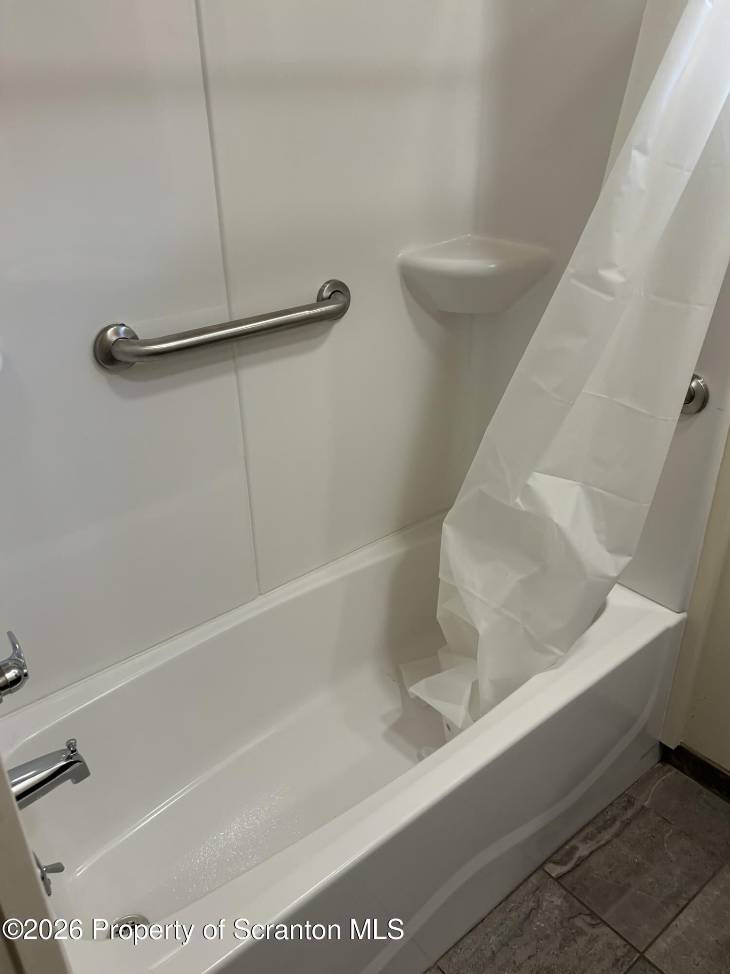146 6th Street Blakely, PA 18447 - Photo 23 of 24 a bathroom with a shower