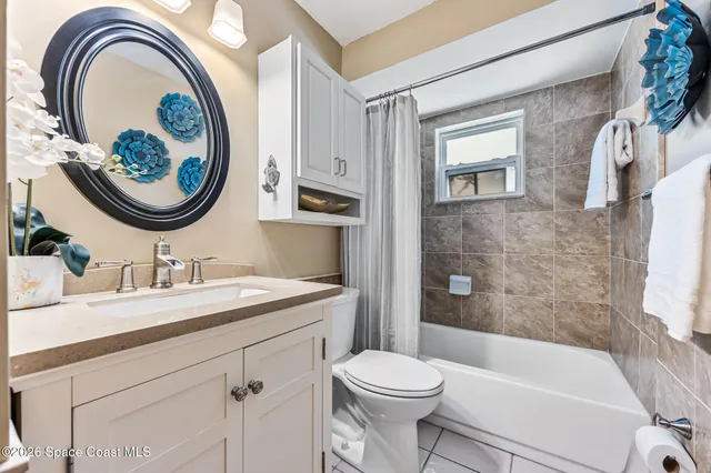 a bathroom with a toilet a sink and a bathtub