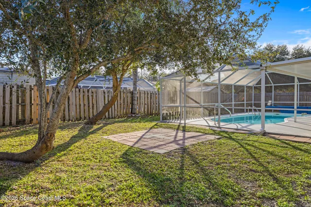a view of a backyard with a slide