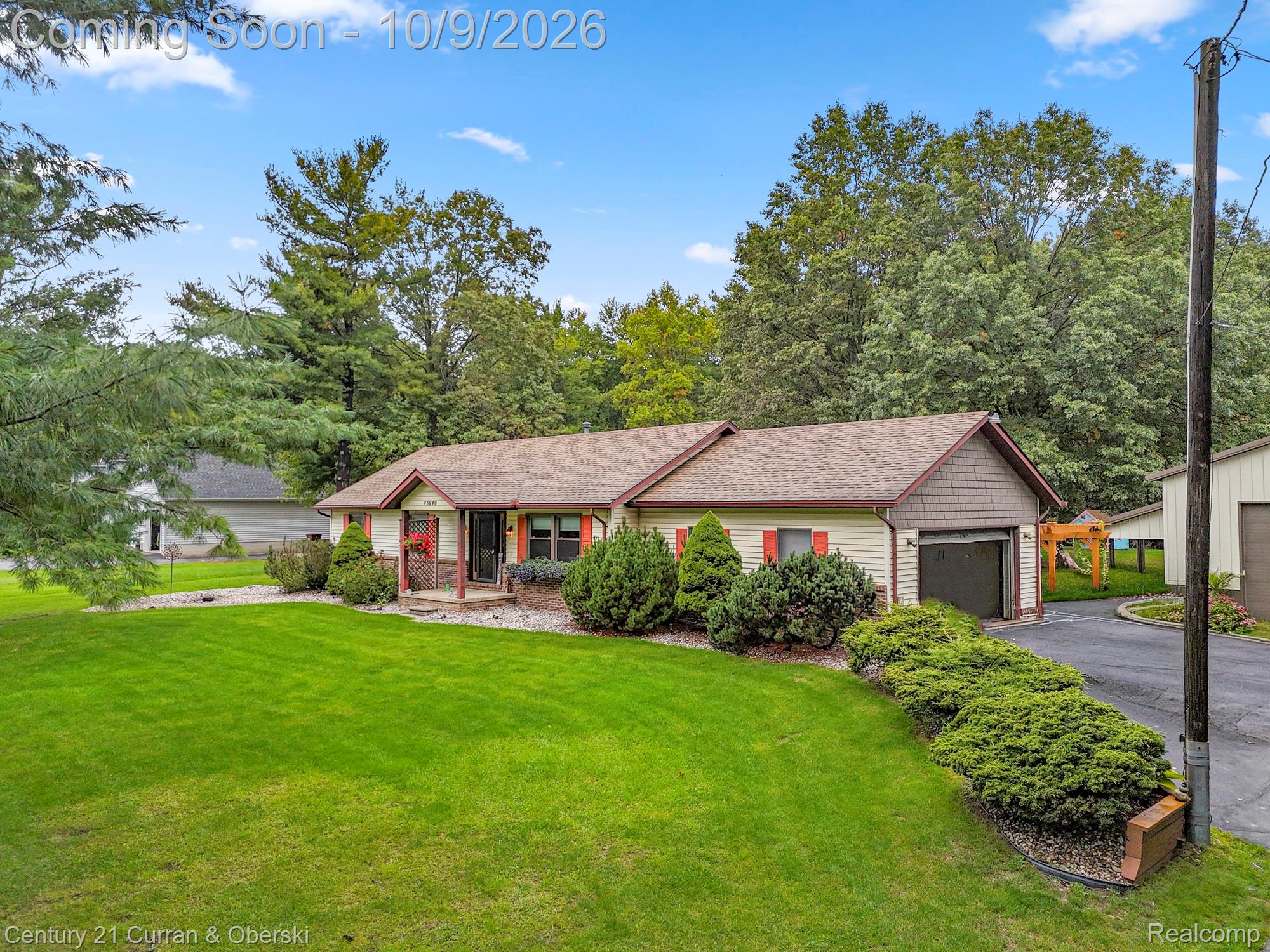 43040 Willis Road Belleville, MI 48111 - Photo 2 of 65 Ranch-style residence featuring a prominent attached garage and covered front entry