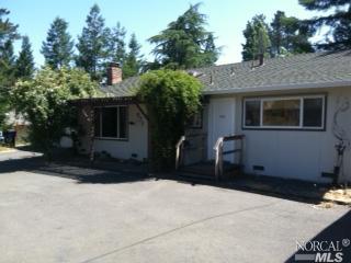 971 Pleasant Hill Road Sebastopol, CA 95472 - Photo 1 of 1 a front view of a house with a yard