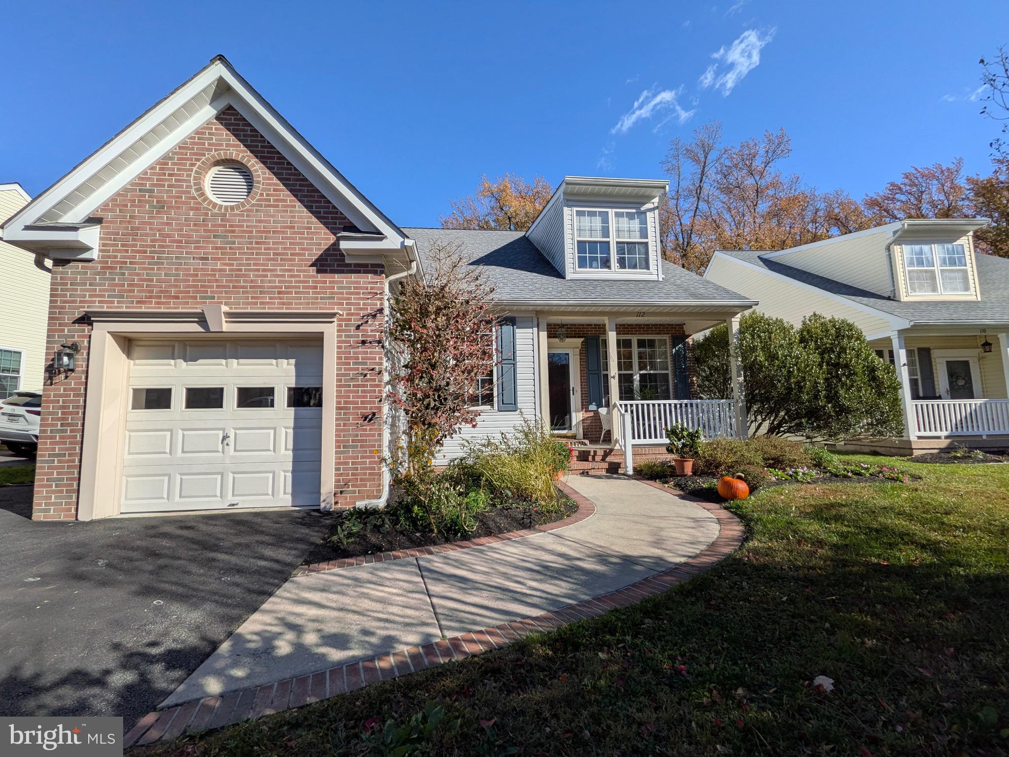 112 Chessie Court Chester, MD 21619 - Photo 1 of 37 a front view of a house with yard and green space