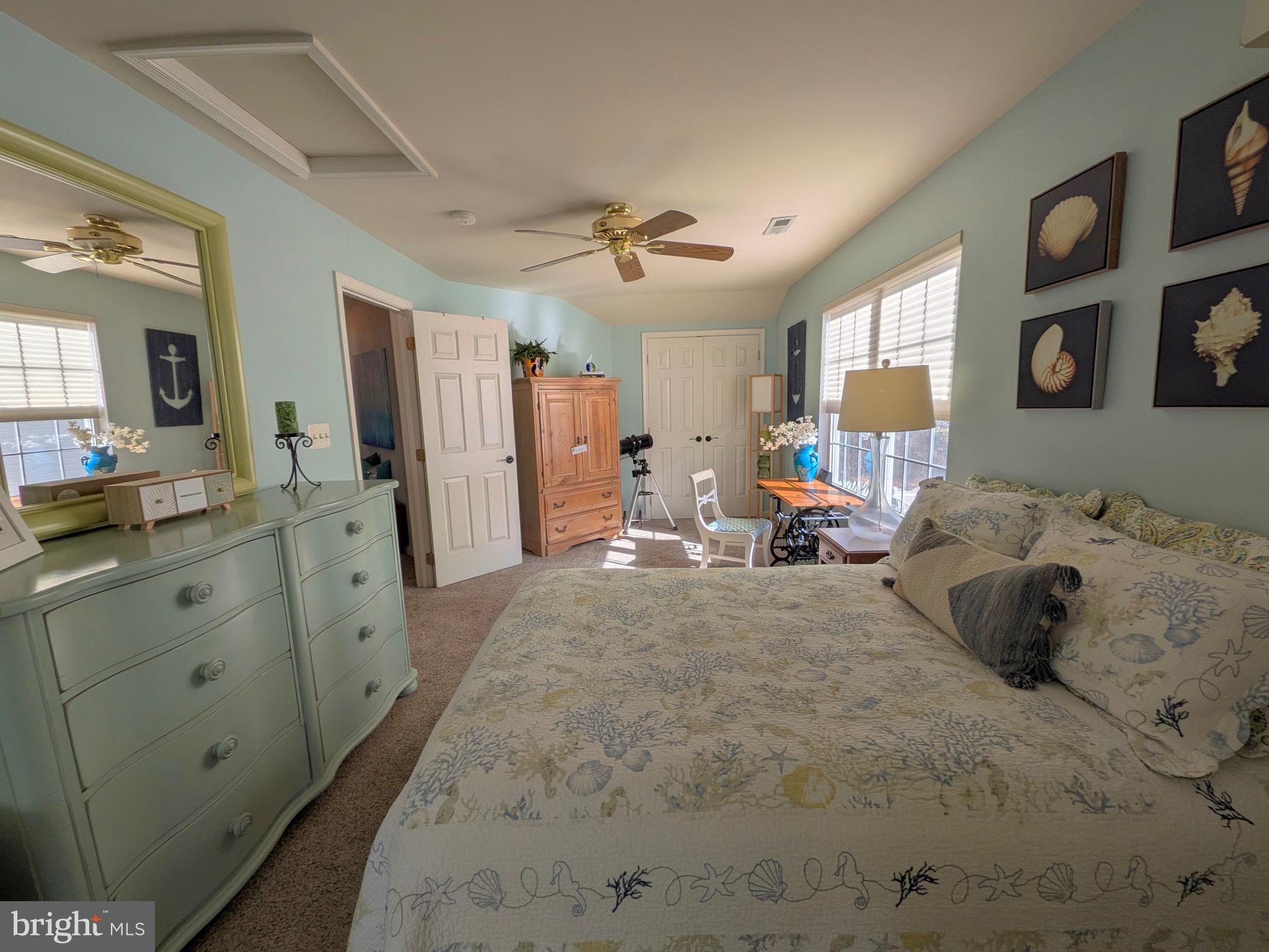 112 Chessie Court Chester, MD 21619 - Photo 23 of 37 a bed room with furniture and a mirror